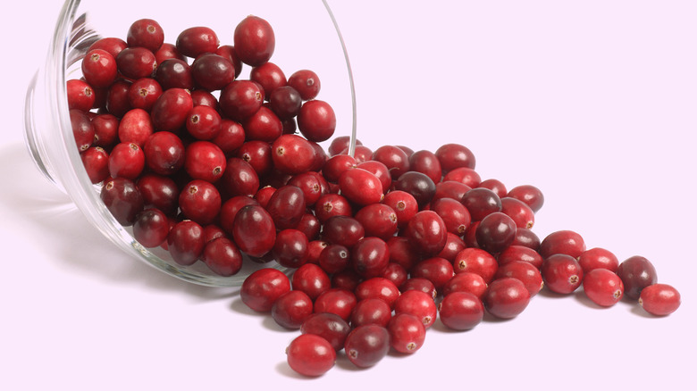 Spilled bowl of fresh cranberries