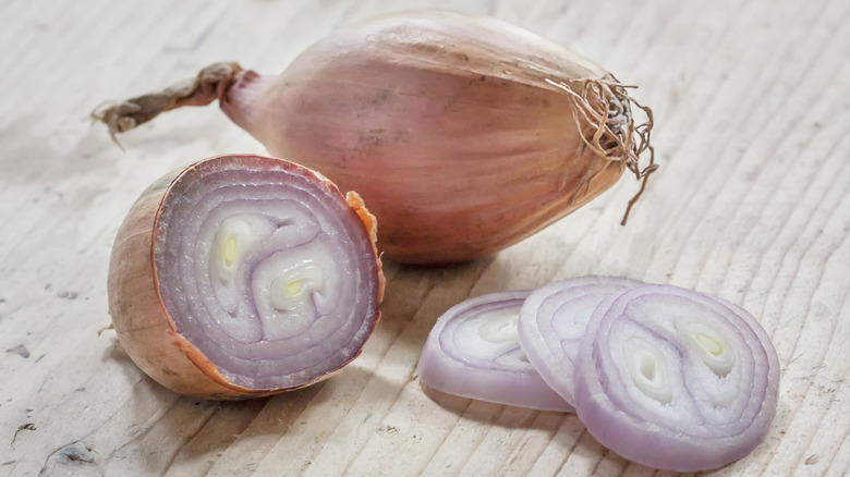 Sliced shallot on a cutting board