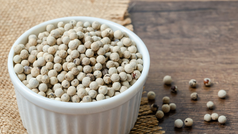 White peppercorns in bowl