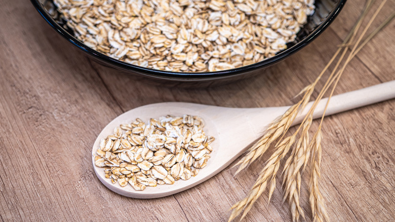 Bowl of rolled oats with a spoon