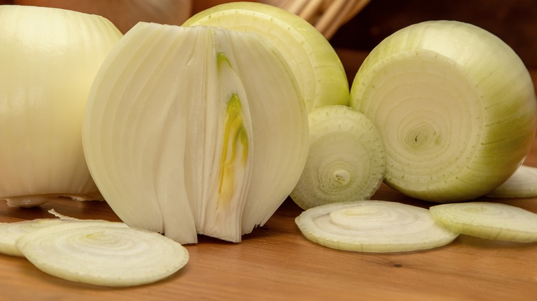 sliced onions on cutting board