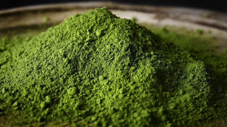 Close-up of a pile of deep green, fine-ground matcha powder