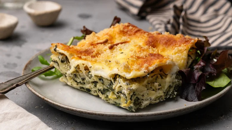 Spinach and artichoke lasagna slice