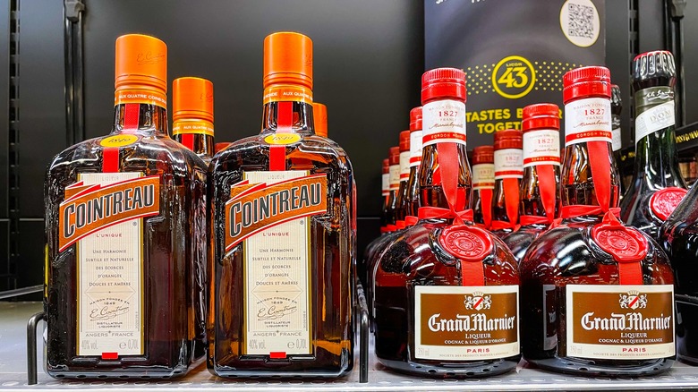 Orange liqueur bottles on shelf