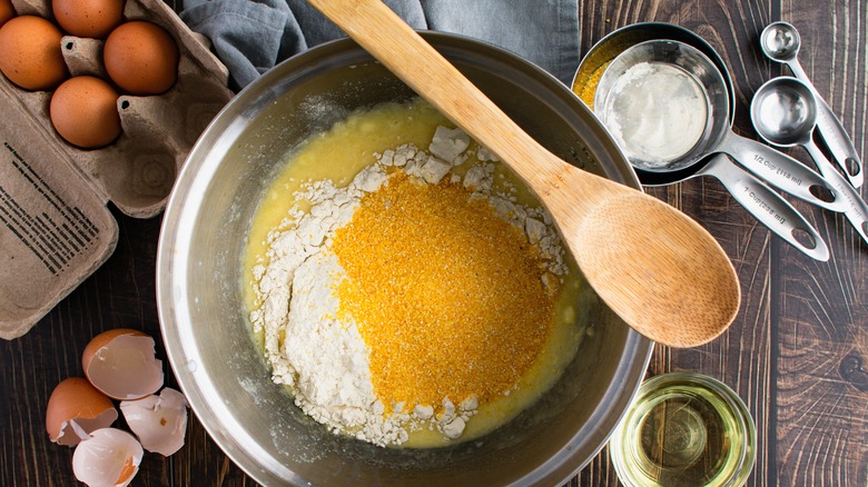 Cornbread ingredients with spoon