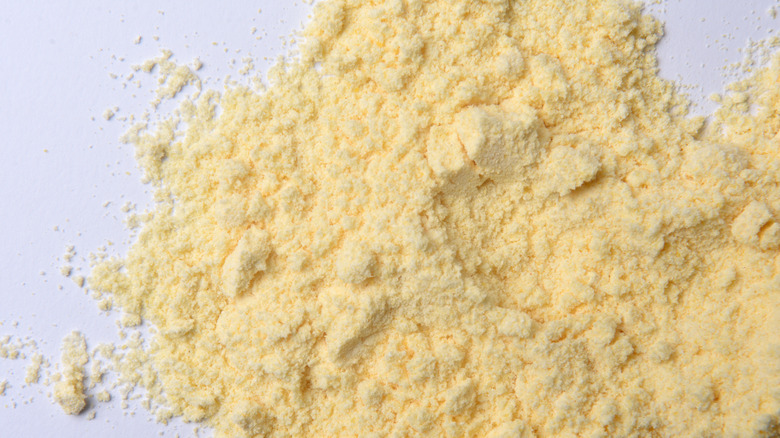 Finely ground cornmeal, white background