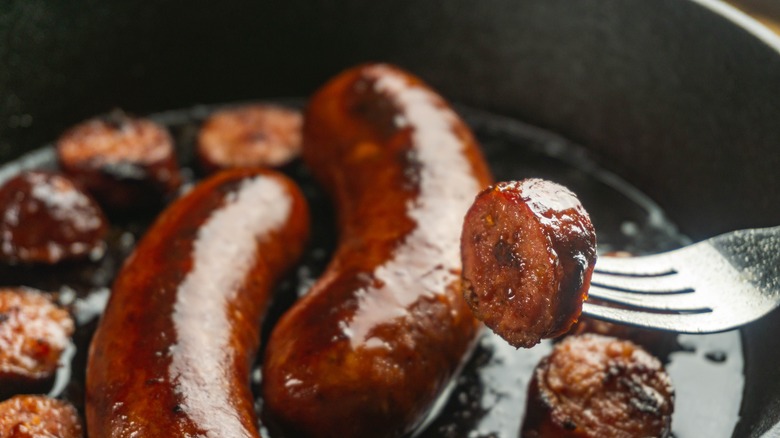 Cast iron pan with bratwurst