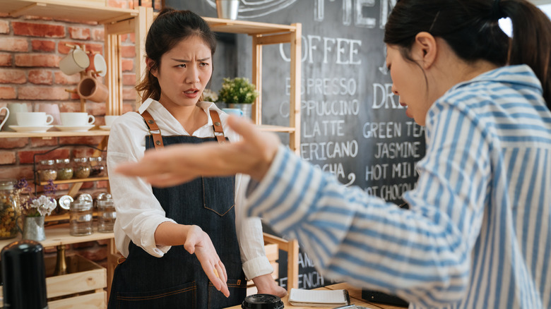 barista annoyed with customer