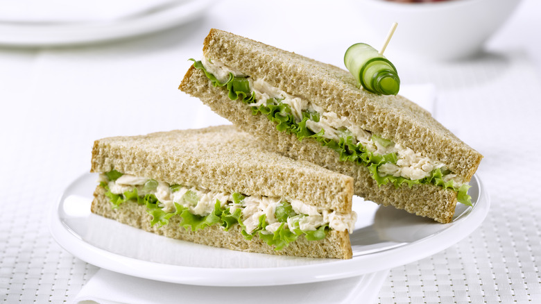 Plate of stacked tuna salad sandwiches