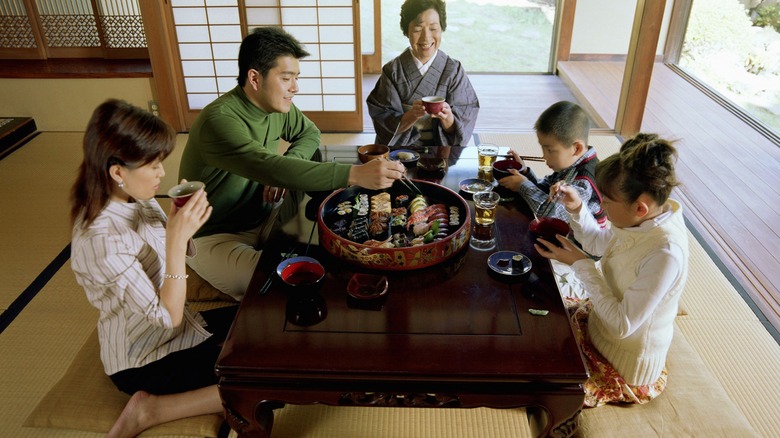 Family sitting around table