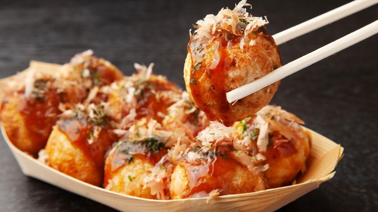 Takoyaki with chopsticks