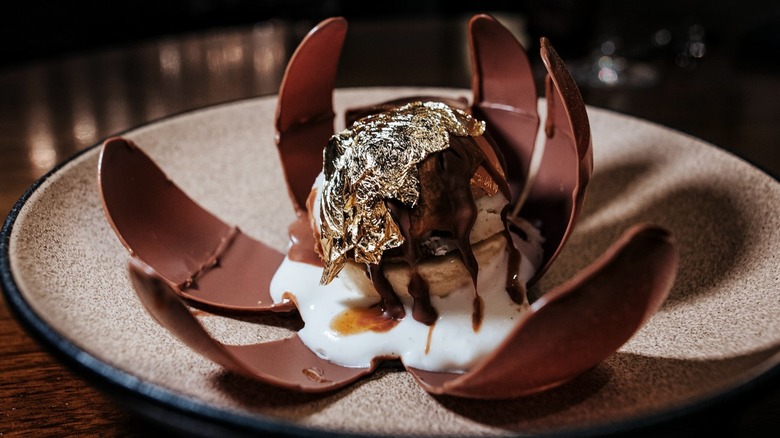 The Banana Cream Pie at Cut chocolate shell broken open