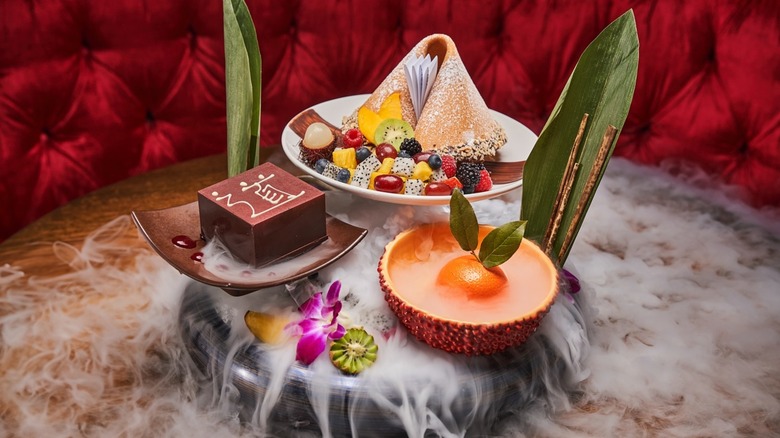 The Giant Fortune Cookie at Tao with other desserts on a display