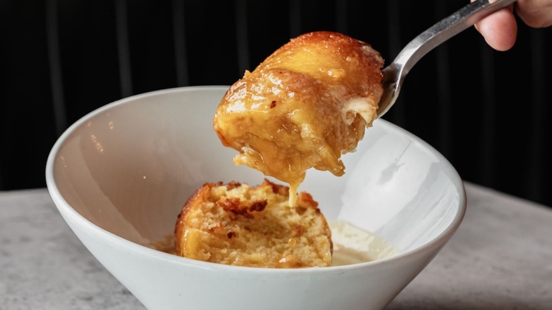 The Glazed Donut Bread Pudding at Carson Kitchen on a spoon