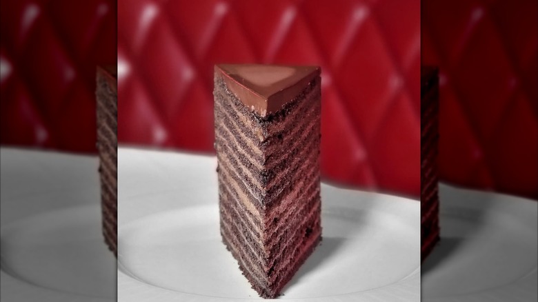 The Signature 24-layer Chocolate Cake at the Strip House on a white plate