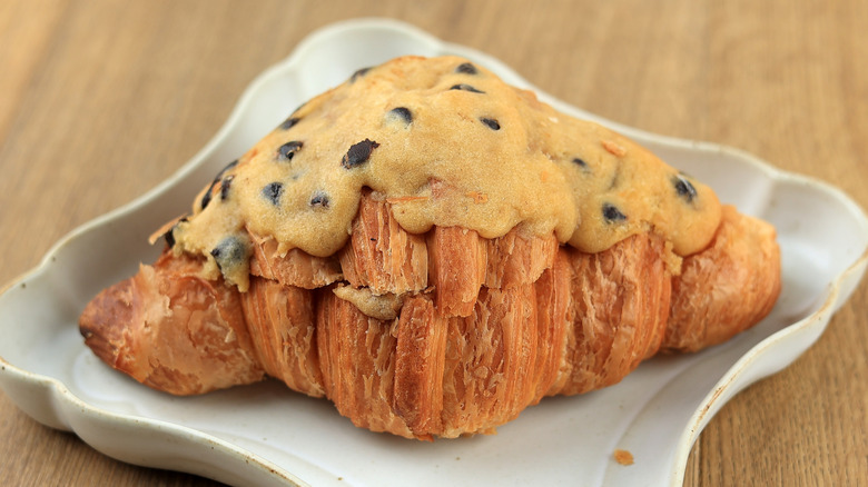 Cookie-stuffed croissant in a white dish