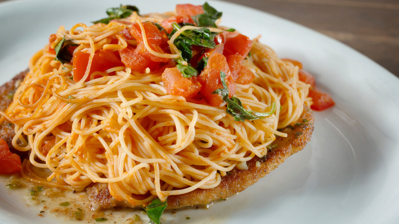 Angel hair pomodoro on white plate