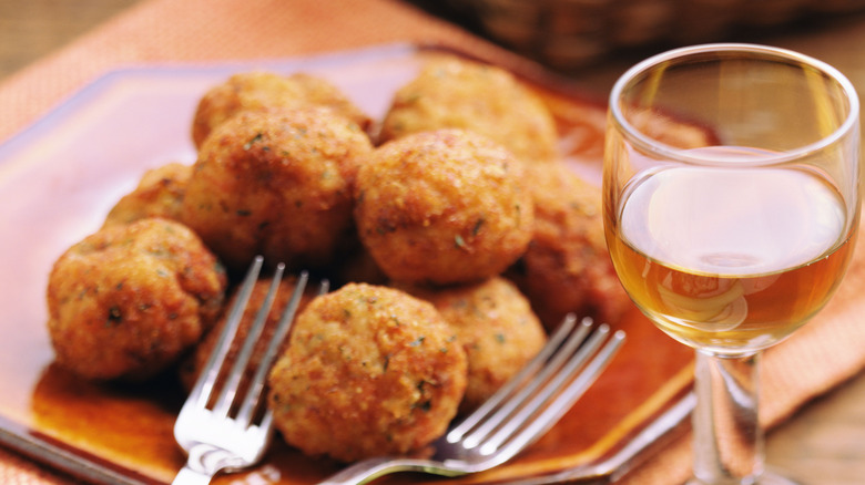 fried rice balls and wine