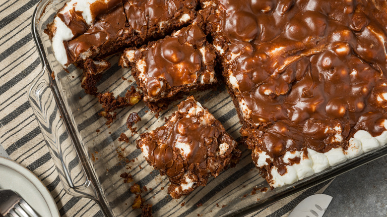 Blocks of Mississippi Mud Pie ready to be served out of a baking dish