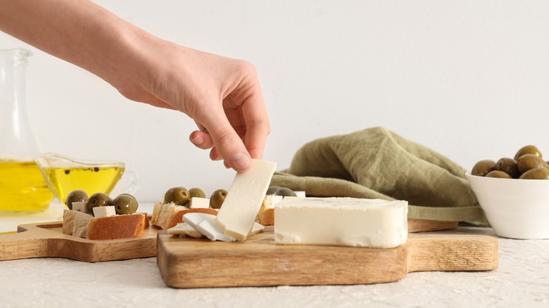 sliced feta on cutting board