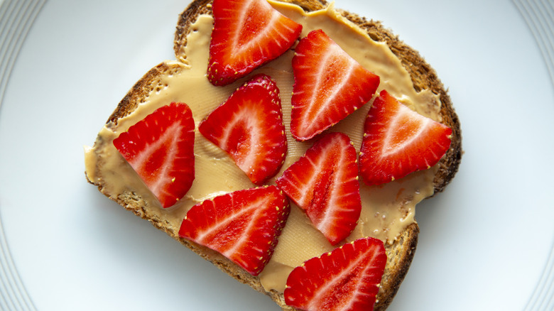 sliced strawberries on toast