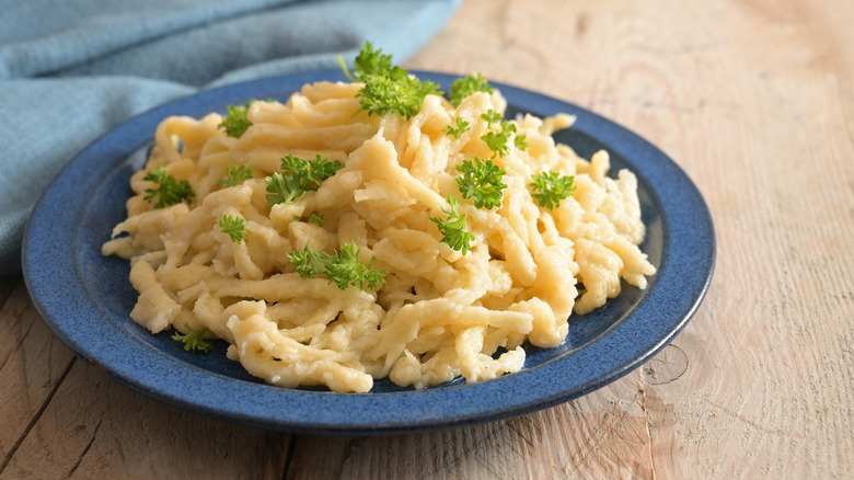 German spätzle on blue plate