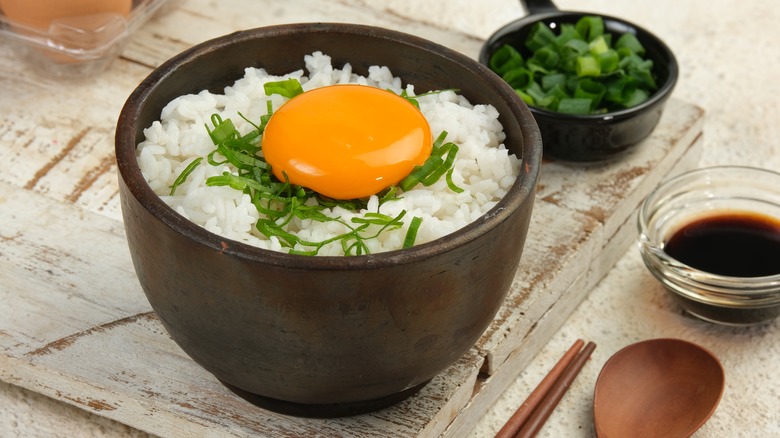 Tamago kake gohan in a bowl on table