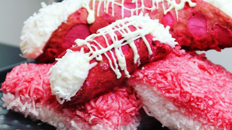 pink and white coconut grater cake stacked