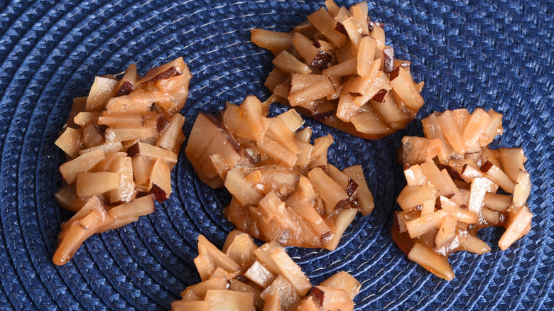 Coconut drops on blue mat