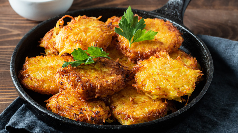 fried potato pancakes in skillet