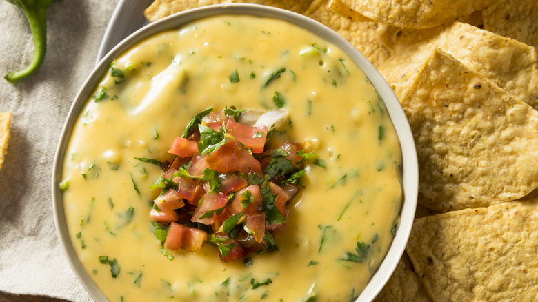 Queso with salsa and tortilla chips