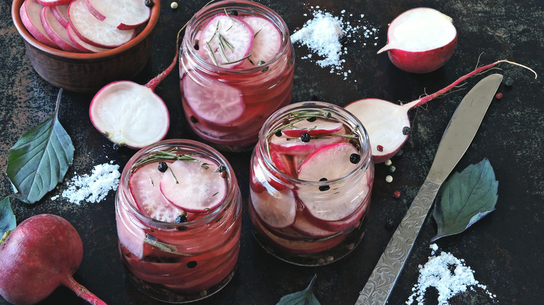 Pickled radishes in jars