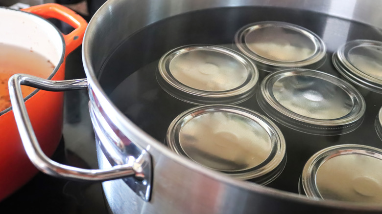 Cans in a water bath