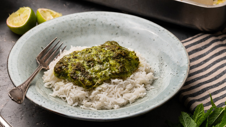 Herb-coated cod on rice