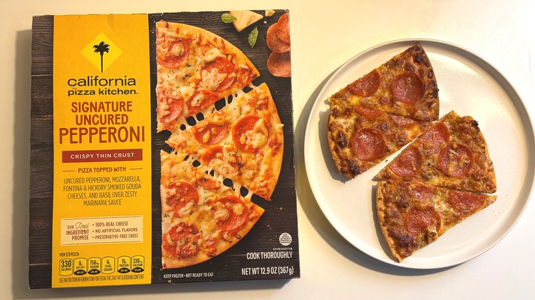 California Pizza Kitchen frozen pepperoni pizza on plate next to box on white table