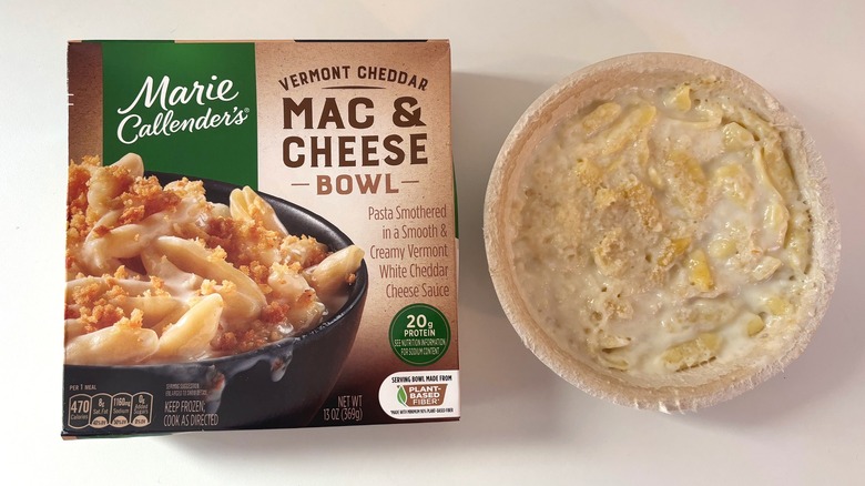 Marie Callendar's frozen Vermont Cheddar mac & cheese bowl next to box on white table