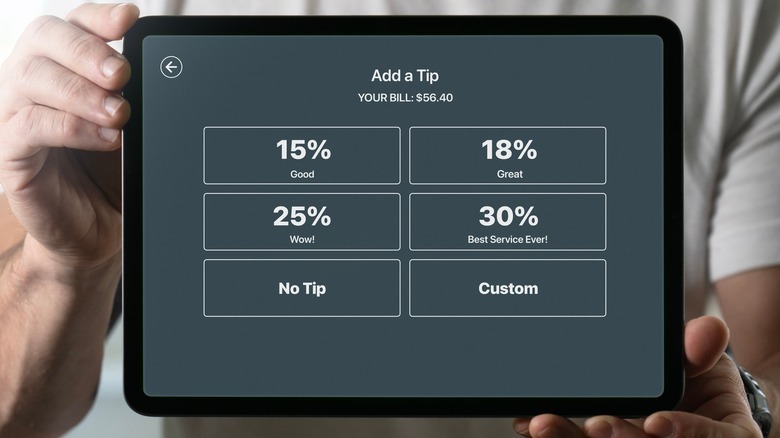 A computerized tipping screen