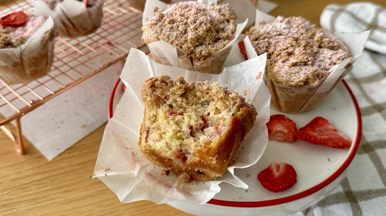 Rhubarb muffins with strawberry streusel on plate