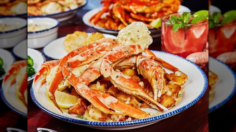 White plate piled with crab legs