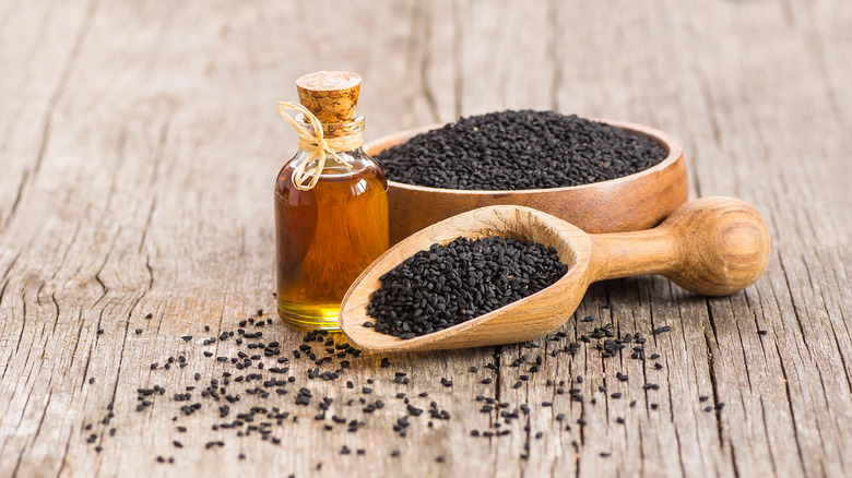 Black cumin seeds with oil