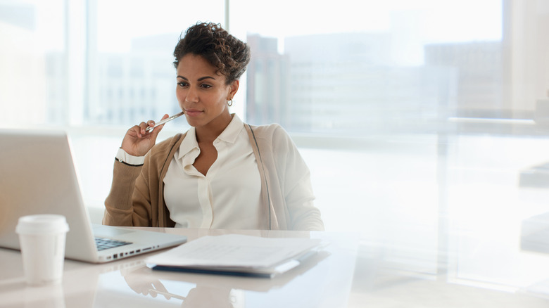 Woman using laptop computer