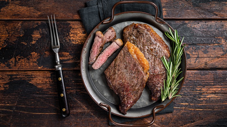 Picanha steak on a wooden table 