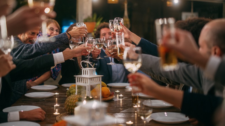 People toasting at a restaurant