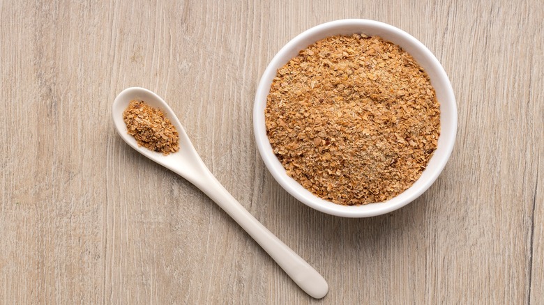 Soy powder in bowl with spoon