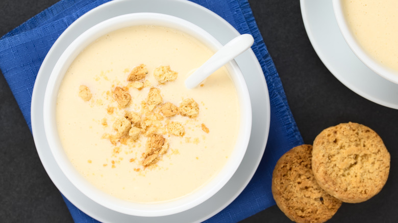 White soup with crumbled cookies 