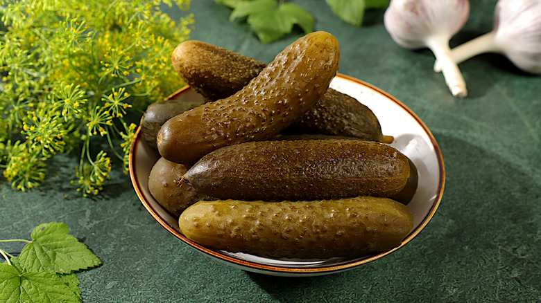 Dill pickles in bowl