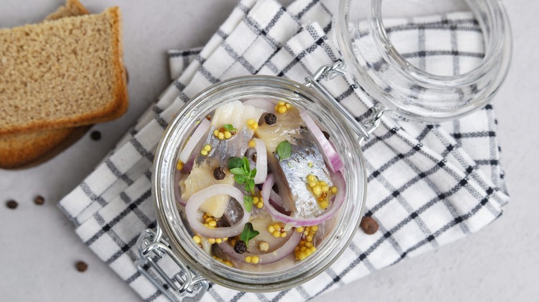 Toast and pickled herring jar