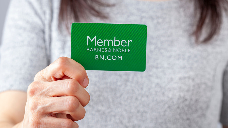 Barnes & Noble old green membership card held in hand