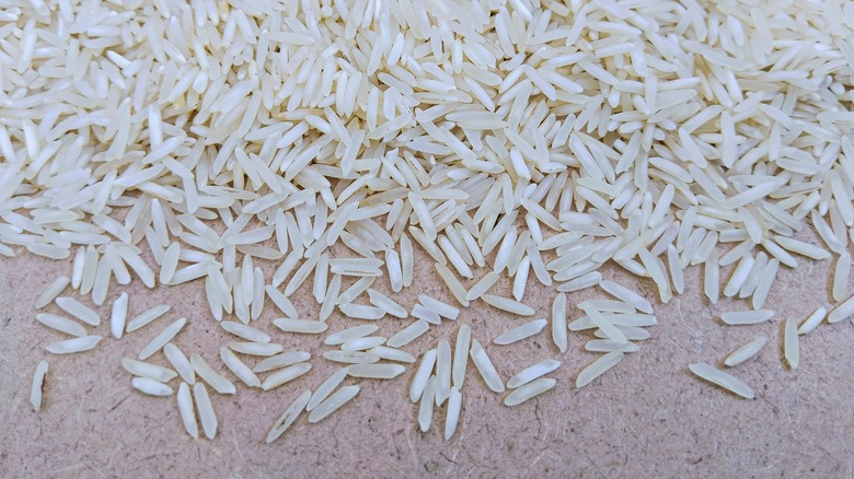 Rice grains on table