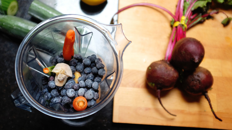 Fruit and beets with blender